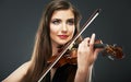 Music portrait of young woman. Violin play.