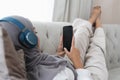 Music For Relax. Calm asian Girl In Hijab And Wireless Headphones Listening Favorite Songs At Home, Resting On Royalty Free Stock Photo