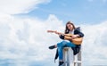 music school classes. small guitar player on sky background. country music style. string musical instrument. play on Royalty Free Stock Photo