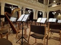 Music score with notes in hall of the conservatory at classical music concert Royalty Free Stock Photo