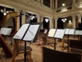 Music score with notes in hall of the conservatory at classical music concert Royalty Free Stock Photo