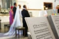 Music score over stand during the wedding ceremony in a church