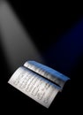 Music sheets under the reflector lights Royalty Free Stock Photo