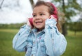 Music, smile and baby in a park with headphones, radio freedom and streaming audio in Portugal. Podcast, happy and face Royalty Free Stock Photo