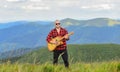 Music for soul. Playing music. Sound of freedom. In unison with nature. Acoustic music. Musician hiker find inspiration Royalty Free Stock Photo