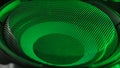 Subwoofer with membrane green neon light moving vibrating, macro sound bass circles, abstract background. Royalty Free Stock Photo