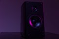 music speaker from home theater on dark background with purple backlight, music industry professionals concept Royalty Free Stock Photo