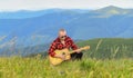 Music speaks. sexy man with guitar in checkered shirt. hipster fashion. western camping and hiking. happy and free Royalty Free Stock Photo