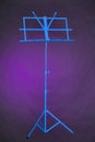 Music Stand Blue Isolated On Purple