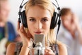 Music studio, portrait and woman with microphone, headphones and band performance with talent. Singing, art and face of Royalty Free Stock Photo