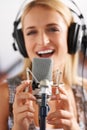 Music studio, singer and woman with microphone, headphones and performance with portrait of talent. Voice, art and face Royalty Free Stock Photo