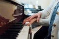 Music teacher helps student to play correctly Royalty Free Stock Photo