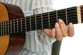 Music teacher playing acoustic guitar, closeup view Royalty Free Stock Photo