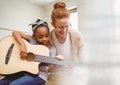 Music teacher with student Royalty Free Stock Photo