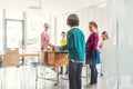 Music teacher with students in class on the xylophone Royalty Free Stock Photo