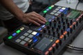 music, technology, people and equipment concept - man using mixing console