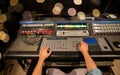 Man using mixing console in music recording studio Royalty Free Stock Photo