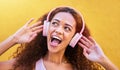 Music, thinking and wow with a black woman listening to the radio outdoor on a yellow wall background. Headphones Royalty Free Stock Photo