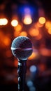 Musical ambiance microphones close up silhouette amid out of focus stage lights