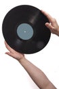 Musical background, guitar and old vinyl records in female hands,, Royalty Free Stock Photo