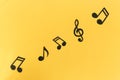 Musical background. notes on a yellow background.