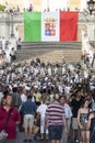 Musical band and Italian Flag in the Spanish Steps in Rome, Italy. Crowd people