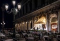 Musical band plays in restaurant on San Marco square at night, Venice, Italy Royalty Free Stock Photo