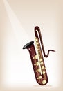 A Musical Bass Saxophone on Brown Stage Background Royalty Free Stock Photo