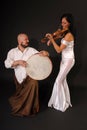 Musical duet drum and violin Royalty Free Stock Photo