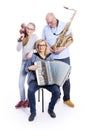 Musical family with saxophone, violin and accordion in studio