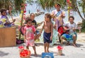 Musical family welcoming cruise passengers