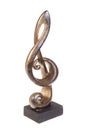 Musical G-clef statuette, isolated on white. Award statuette