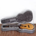 Musical instrument - Broken acoustic guitar in hard case Royalty Free Stock Photo