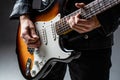 Musical instrument. Electric guitar. Repetition of rock music band. Music festival. Man playing guitar. Close up hand Royalty Free Stock Photo