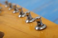 Musical instrument - Fragment headstock neck tuning peg electric guitar Royalty Free Stock Photo