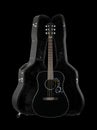 Musical instrument - Front view black folk acoustic western guitar in hard case isolated Royalty Free Stock Photo