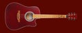 Musical instrument - Front view brown cutaway acoustic guitar on red Isolated Royalty Free Stock Photo