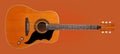 Musical instrument - Front view classic vintage acoustic guitar folk. Isolated on orange Royalty Free Stock Photo