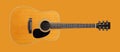 Musical instrument - Front view classic vintage acoustic guitar Isolated orange Royalty Free Stock Photo