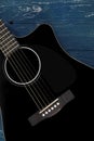 Musical instrument - Silhouette Black cutaway acoustic guitar wood background Royalty Free Stock Photo