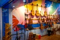 The musical instrument store is full of various violins and musical instruments