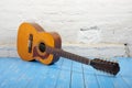 Musical instrument - Twelve-string acoustic guitar white brick b Royalty Free Stock Photo