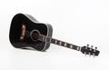 Musical instrument - vintage black acoustic guitar white background Royalty Free Stock Photo