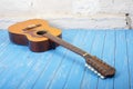 Musical instrument - Twelve-string acoustic guitar brick background Royalty Free Stock Photo