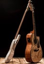 musical instruments, bass drum barrel acoustic guitar and bass guitar on a black background