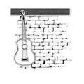 Musical instruments guitar on the brick wall Royalty Free Stock Photo
