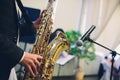 Musical instruments, Saxophone Player hands Saxophonist playing jazz music. Alto sax musical instrument closeup. Royalty Free Stock Photo