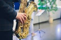 Musical instruments, Saxophone Player hands Saxophonist playing jazz music. Alto sax musical instrument closeup. Royalty Free Stock Photo