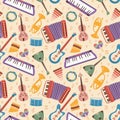 Musical instruments seamless pattern. Cartoon orchestra accessories, funny accordion, guitar, electro piano and maracas Royalty Free Stock Photo