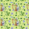 Musical instruments and spring flowers watercolor seamless pattern isolated on green. Painted green clover with harp and Royalty Free Stock Photo